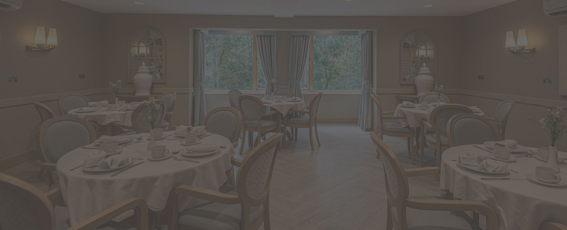 Luxury dining room image with text saying 'Discover All-Inclusive Care at Gwen Walford