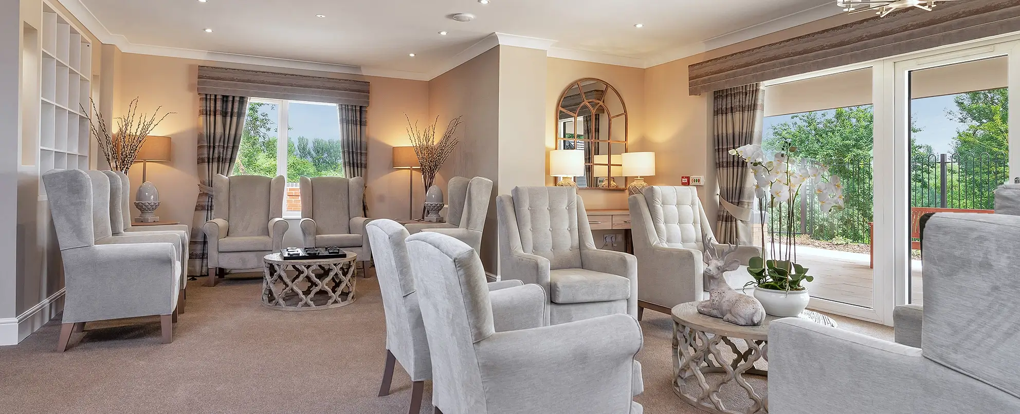 Clusters of grey soft chairs in a lounge room