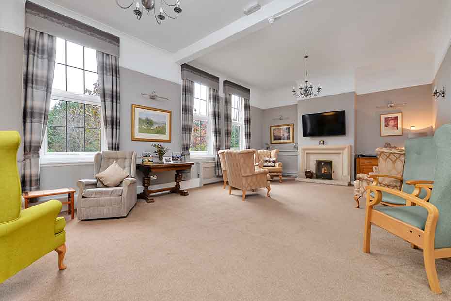 Lounge with comfortable seating overlooking the garden